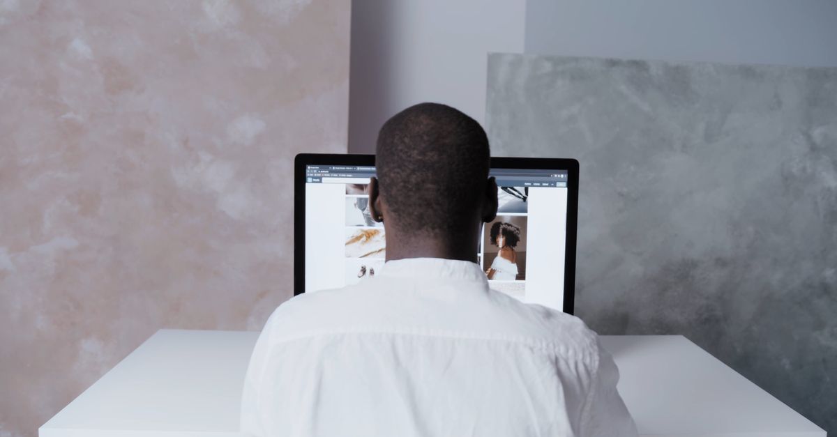 Man Using Computer 4k A man sitting at a desk with a computer screen Free Stock Video Footage ...