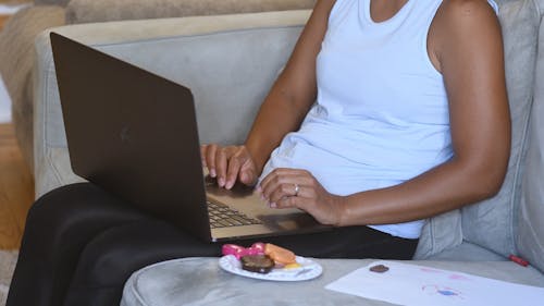 Close-Up View of a Person Using a Laptop