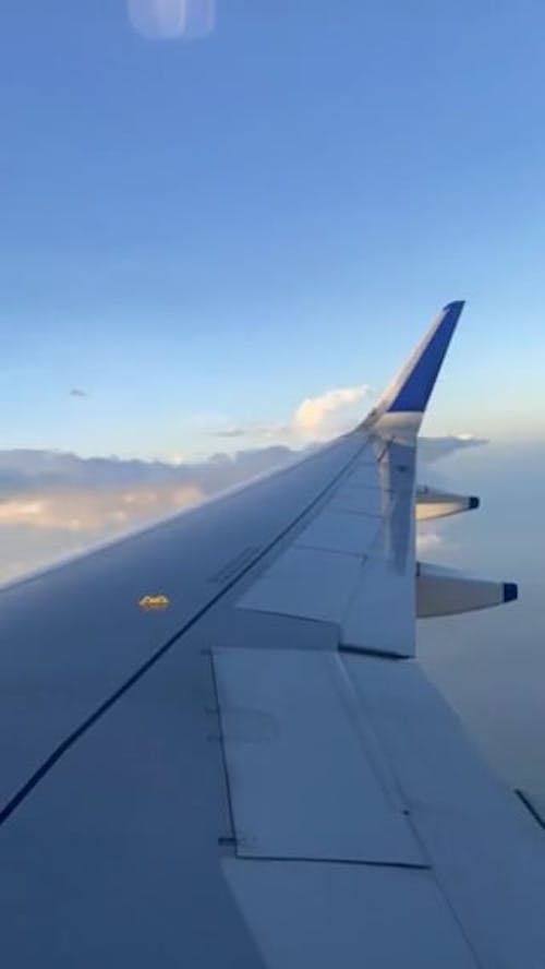 View of Flying Airplane Wing