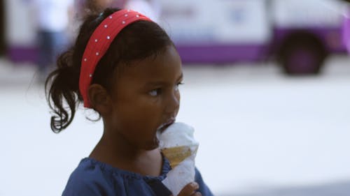 Asian Little Girl with her Ice Cream Cone