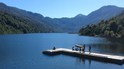 People on Dock with Inflatable Boat