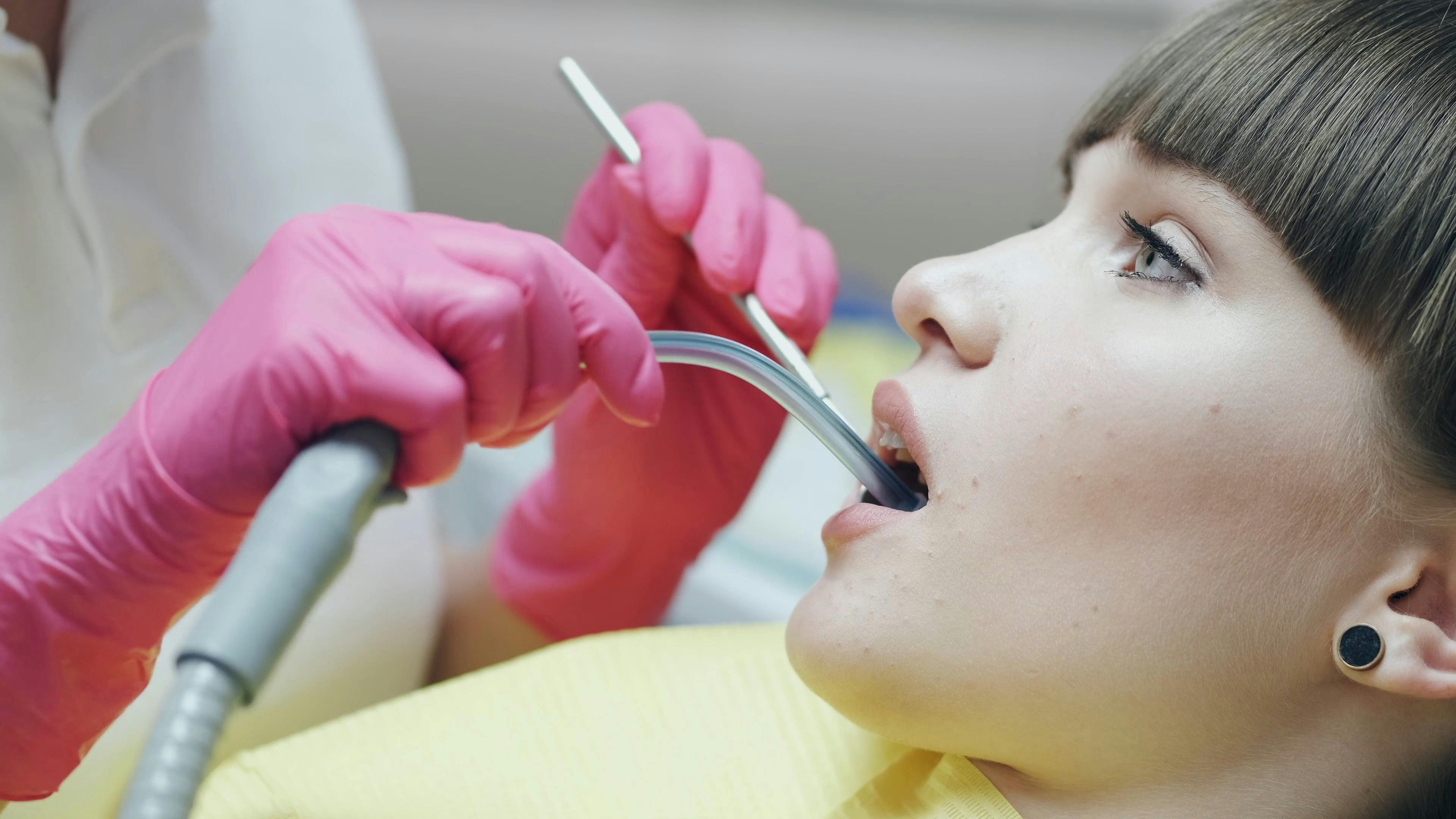 Dentist Cleaning up Patient Teeth · Free Stock Video