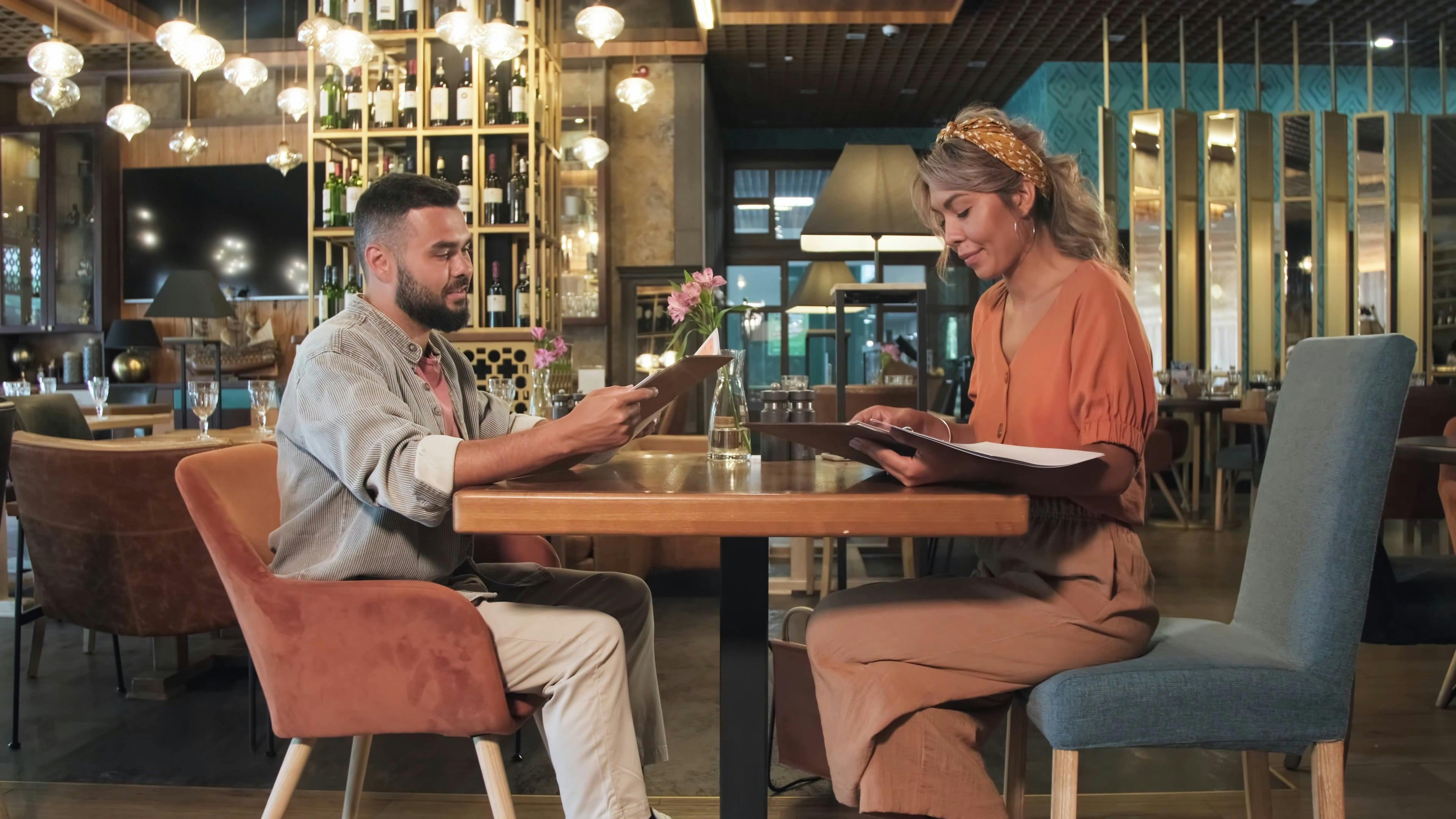 Couple Looking at the Menu · Free Stock Video