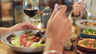 people eating a meal at the restaurant
