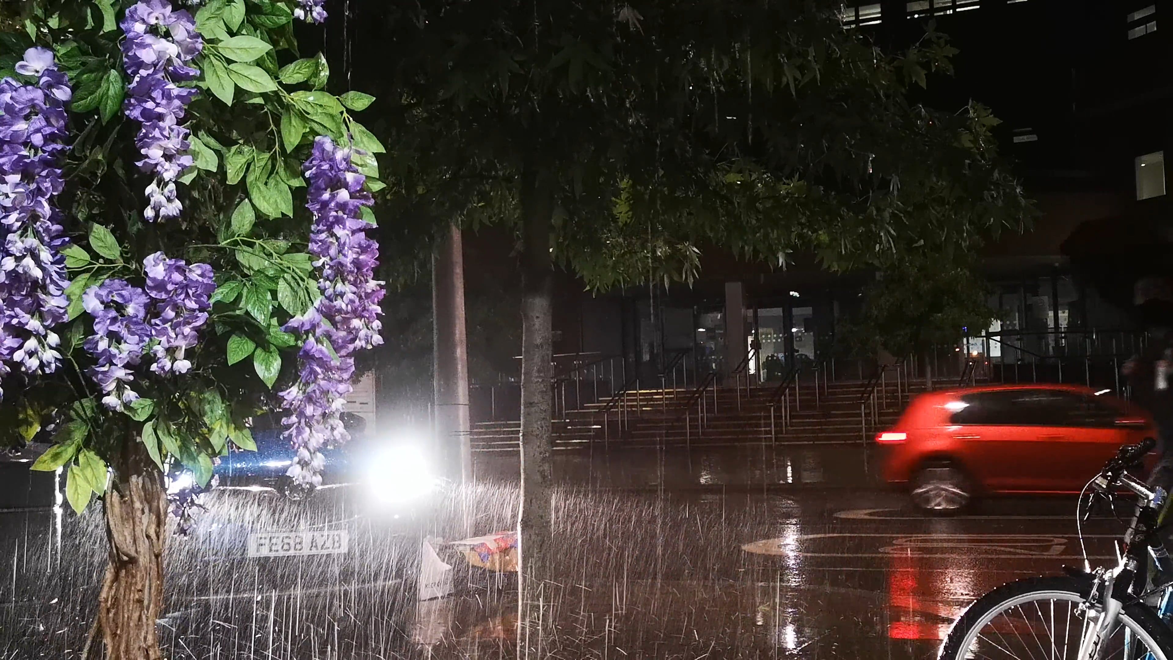 man walking in the rain with umbrella 5108693