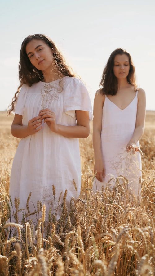 Two Women Posing for Camera in the Farm