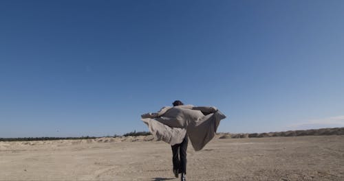 A Man Modeling in the Desert