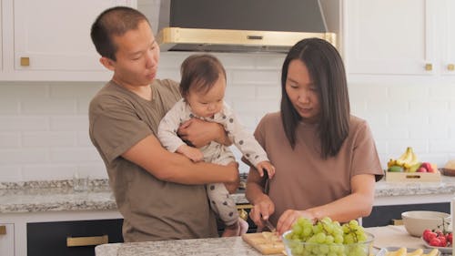 Family Cooking Food in the Kitchen