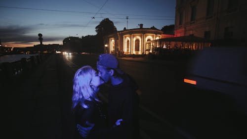 Couple Kissing on the Sidewalk