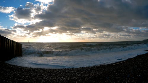 Big Waves Crashing The Pebbles Beach Shore