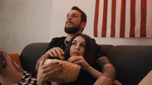 Couple Eating Popcorn