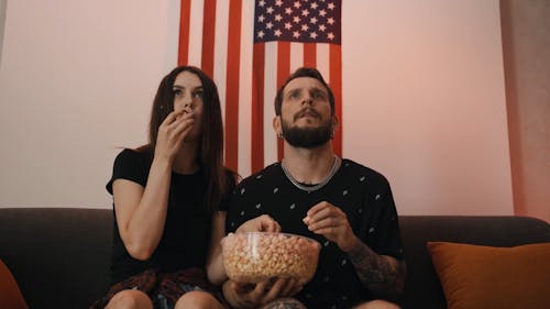 Couple Watching Horror Show at Home