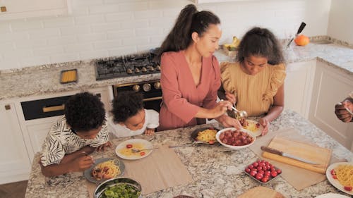 High-Angle Shot of Family Eating Together