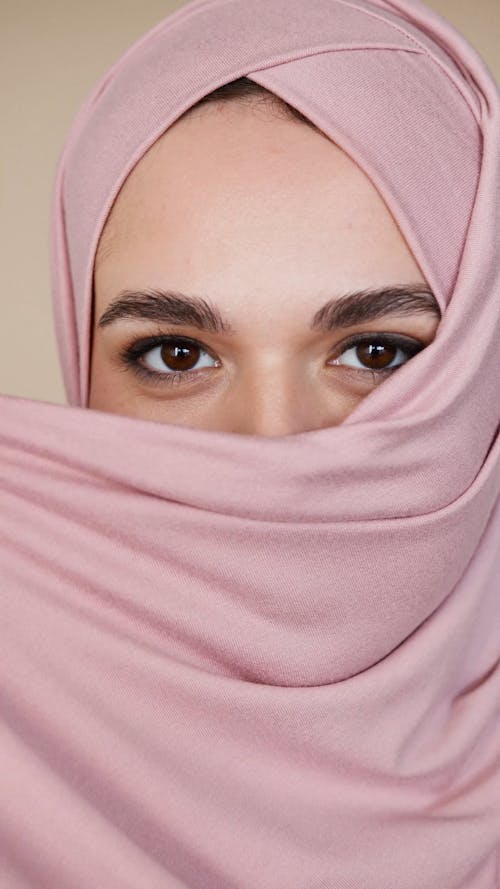 Close-Up View of Woman Wearing Pink Hijab