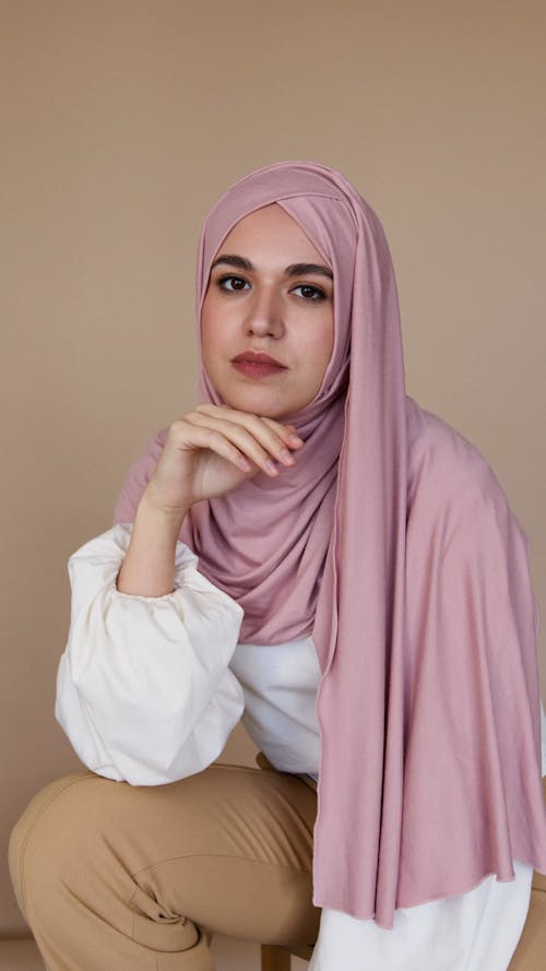 Woman in Pink Hijab Looking at Camera