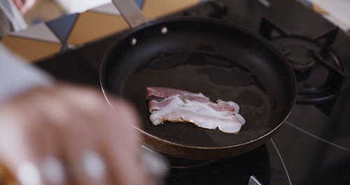 Person Cooking a Breakfast