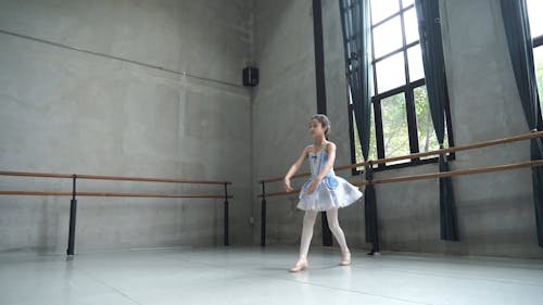 Little Ballerina Dancer Practicing at Studio