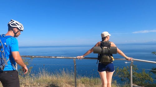 Backpackers Enjoying Beautiful Sea View