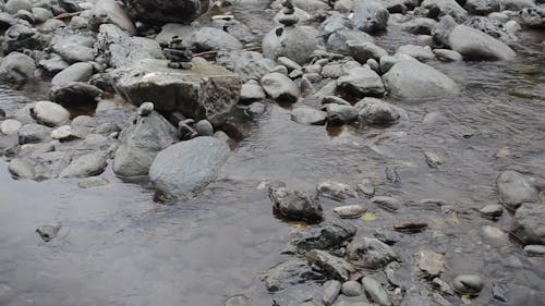 Stacking Of Rocks In The River
