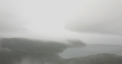 Aerial Video Shot of a Foggy Sea Coast