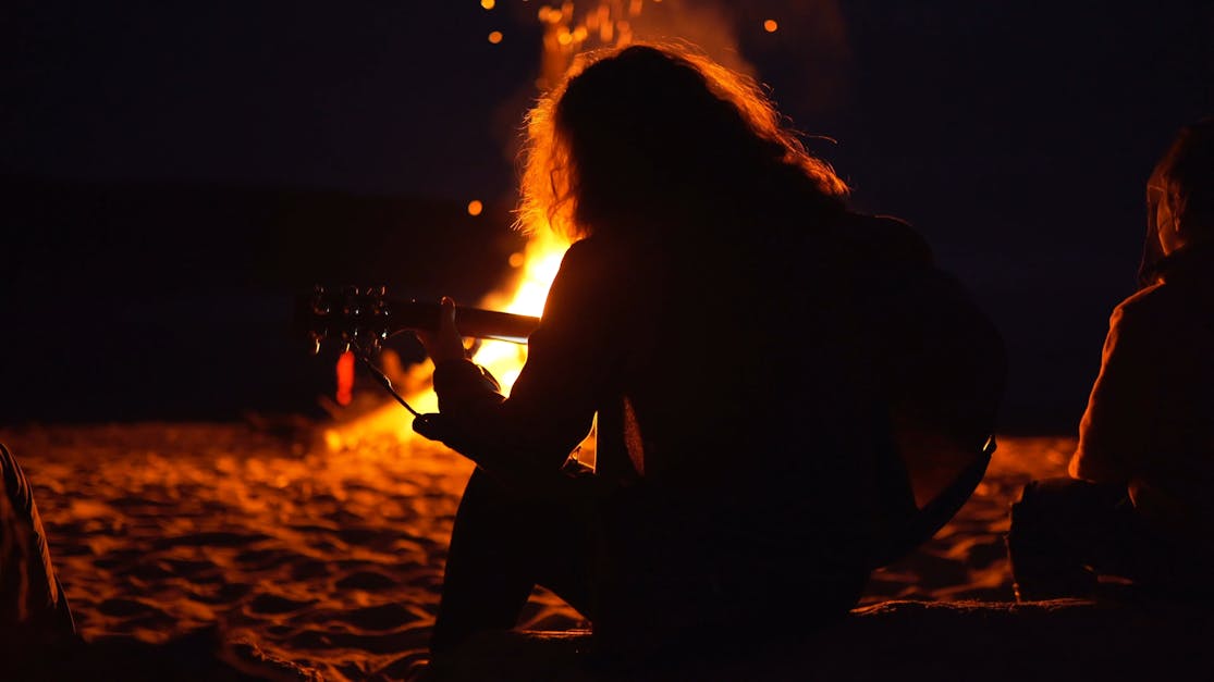 beach campfire guitar