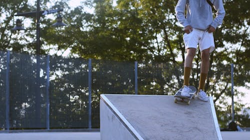 Teenager Guy Skating in a Skate Park