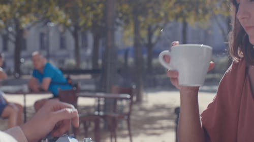  Shallow Focus of Woman Drinking Coffee