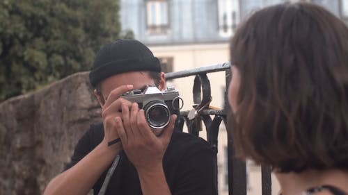 Man Taking Photo of His Girlfriend