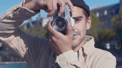 Men Click Camera Focus Man Clicking Picture with his Cannon Camera · Free Stock Video