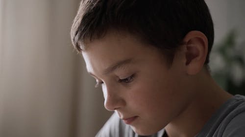 Boy Self-studying at His Home