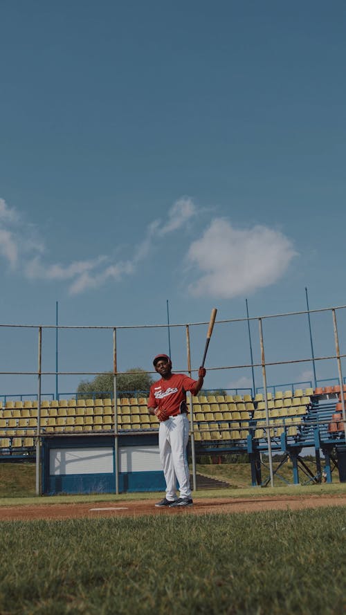 Baseball Player Showing His Happiness by Hitting the Baseball