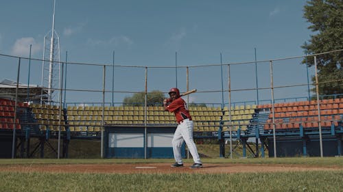 Baseball Player Hitting the Baseball