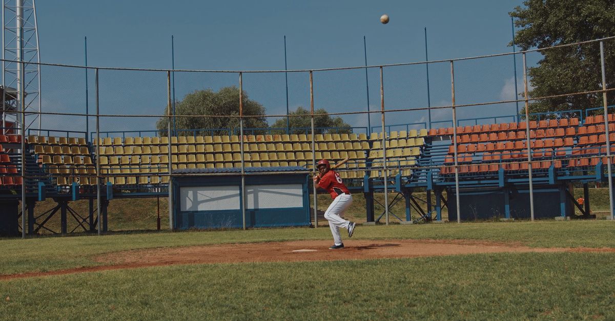 Hitting First Base Baseball Player Hitting the Baseball then Starts Running to First Base ...