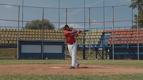 Baseball Player Missing the Baseball then Shows His Frustration