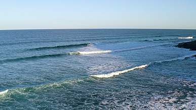 blue sea waves by the seashore