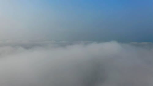 Video Clip of a Town from above the Clouds
