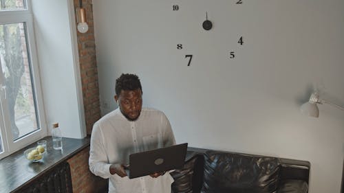 A Man On A Video Call Using A Laptop