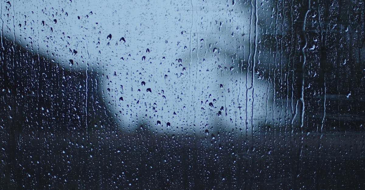 Rain Water Sliding Down The Glass Window Surface · Free Stock Video