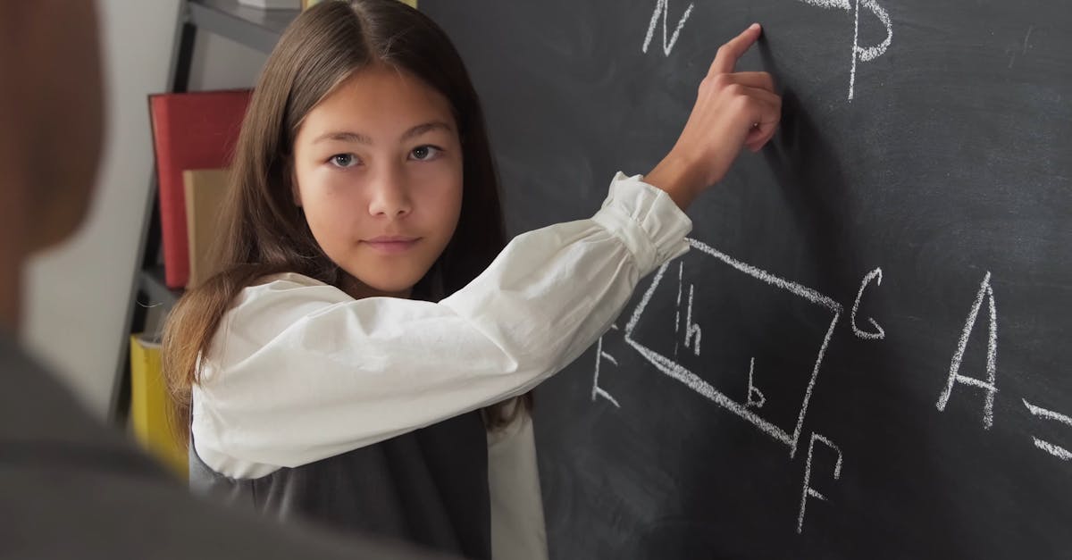 Girl Clearing her Math Doubt on Backboard Free Stock Video Footage ...
