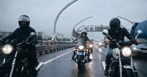 Bikers Riding In Group In The City Road