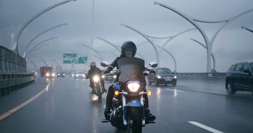 People Riding a Motorcycles on the Highways