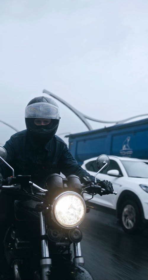 Motorcycle Driving On A Rainy Day