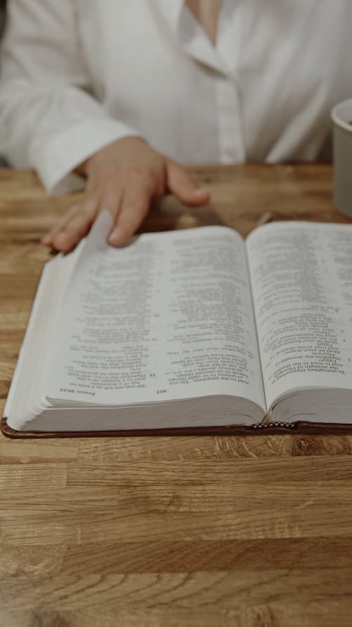 Person Reading a Bible