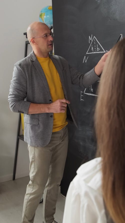 Teacher Explaining Math Concepts to the Class