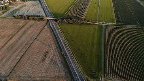 A Highway Built Across An Agricultural Land