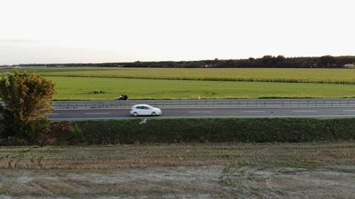 A Highway Built Crossing An Agricultural Land