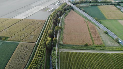 A Highway Crossing An Agricultural Land