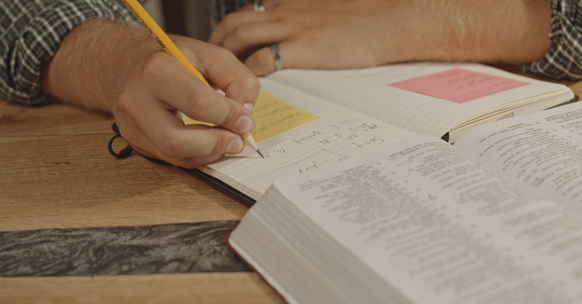 A Man Taking Notes From The Bible Free Stock Video Footage, Royalty ...