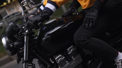 A Couple Riding In Tandem On A Big Bike