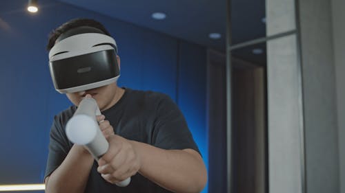 Man Playing Virtual Reality Game